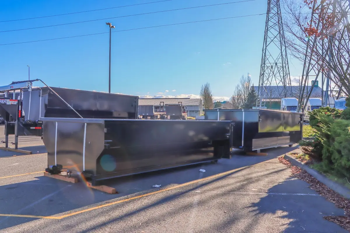 Roll-off dumpster ready for waste disposal at job site for 12 Yard Dumpster Rental in Grenada